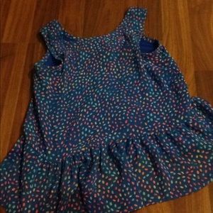 blue shirt with rainbow leaves